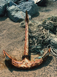 High angle view of fishing net on beach