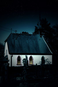 Exterior of old building against sky at night