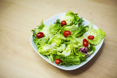 High angle view of salad in bowl on table