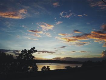 Scenic view of sea against sky at sunset