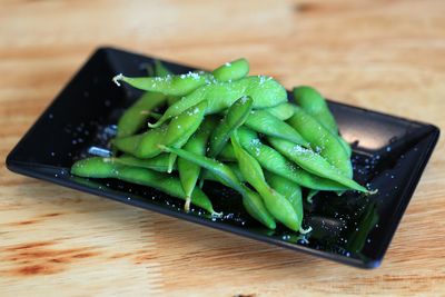 High angle view of leaf in plate on table