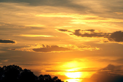 Low angle view of dramatic sky during sunset