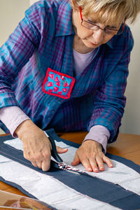 High angle view of a woman with umbrella