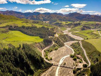 High angle view of road amidst landscape against sky