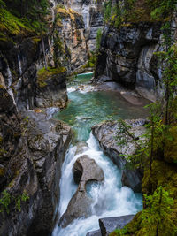 Scenic view of waterfall maligne canyon in jasper national park