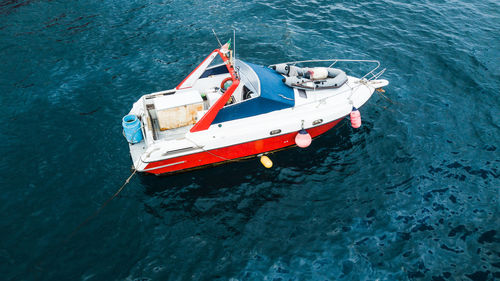 High angle view of boat sailing in sea