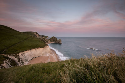 Scenic view of sea against sky during sunset