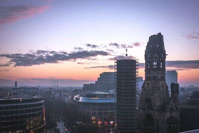 Cityscape against sky during sunset