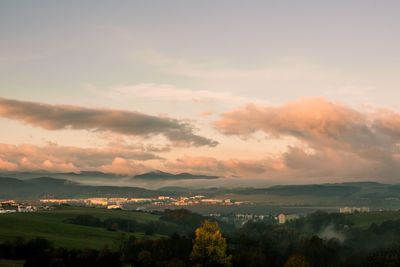 Scenic view of landscape against sky during sunset