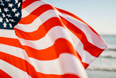 Close-up of flag against the sky