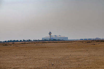 Scenic view of beach against clear sky