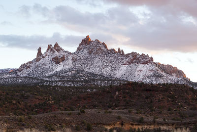 Scenic view of snowcapped mountains against sky