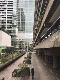 People walking in modern office building