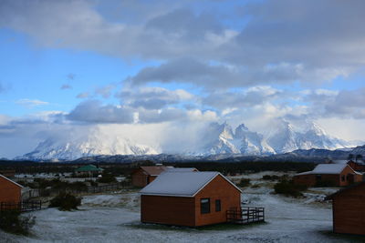 Scenic view of landscape against sky during winter