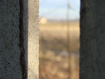 Close-up of metal structure against sky