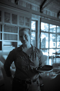 Happy waitress at winery