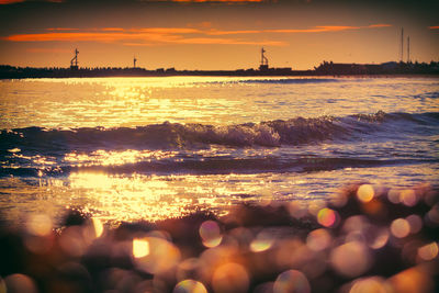 Scenic view of sea at sunset