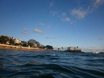 Scenic view of sea against blue sky