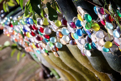 Close-up of multi colored decoration hanging outdoors