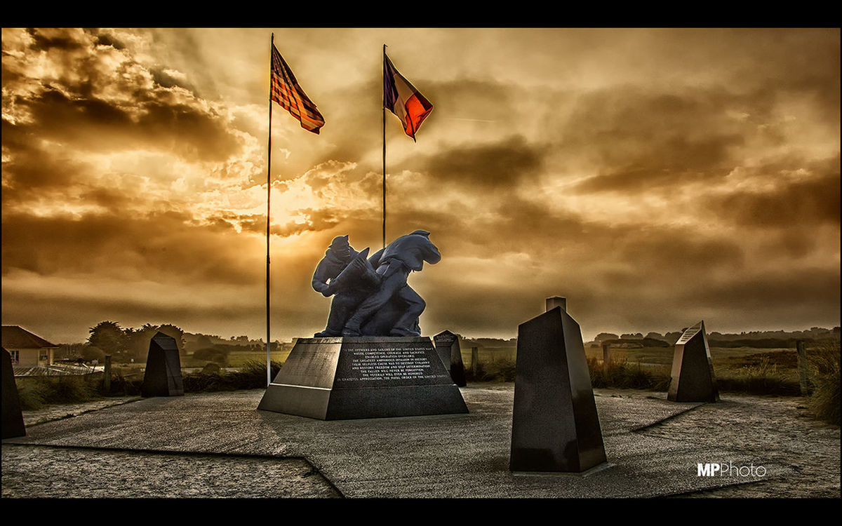 sky, cloud - sky, flag, human representation, cloudy, transfer print, sculpture, patriotism, art and craft, cloud, art, statue, creativity, identity, auto post production filter, national flag, animal representation, overcast, outdoors