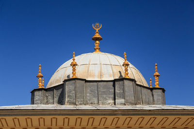 Low angle view of building against blue sky