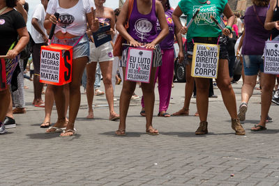 Women are seen protesting during the women day march in the city of salvador, bahia.