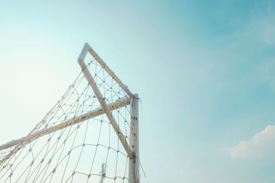 Low angle view of net against clear sky