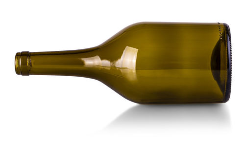 Close-up of beer bottle against white background