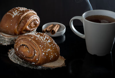 Close-up of coffee served on table