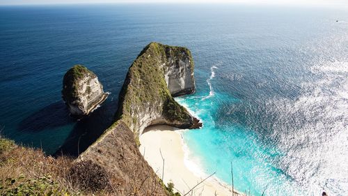 High angle view of rocks in sea