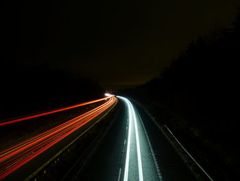 Light trails on road at night