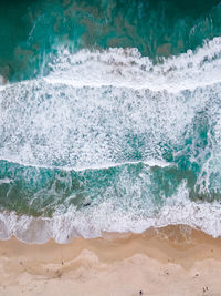 Wave splashing on beach