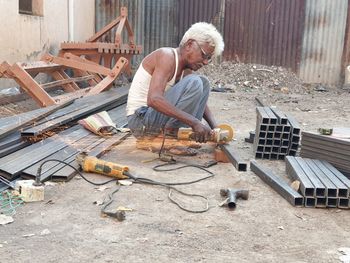 Man working on iron