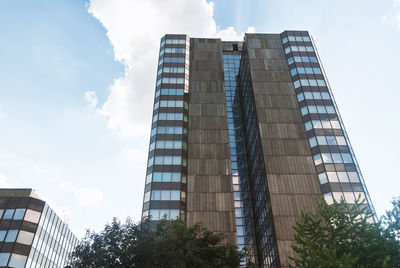 Low angle view of modern buildings against sky