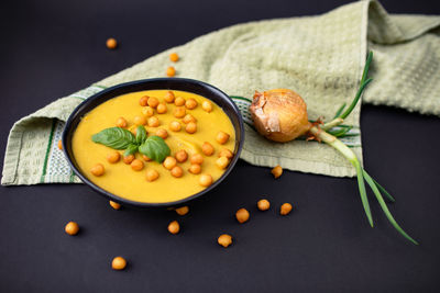 High angle view of vegetables soup in bowl on table