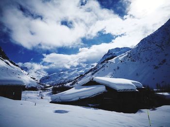 Snow covered mountains against sky