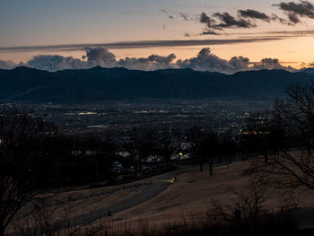 Scenic view of mountains against sky during sunset