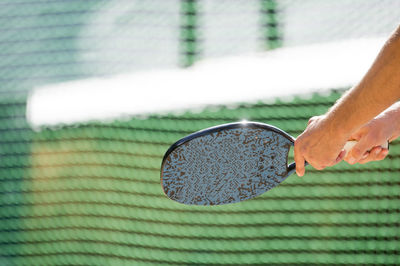 Cropped image of person playing sport