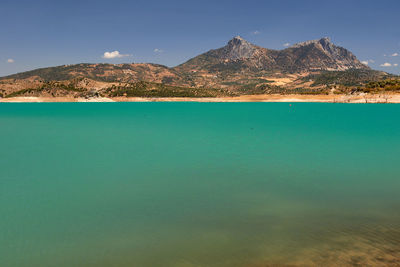 Scenic view of lake against mountain range