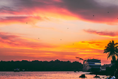 Scenic view of sea against orange sky