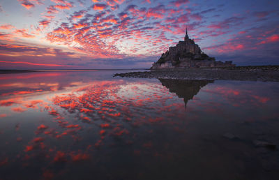 Landscape from the west coast of france at atlantic ocean. sunset with mont saint michel.