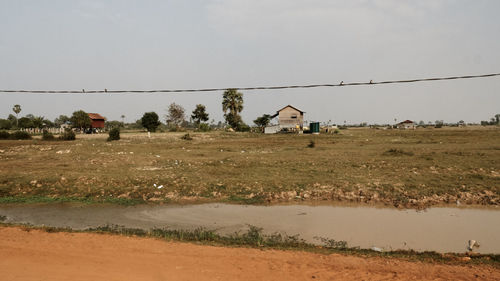 Scenic view of field against clear sky