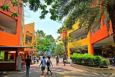 People walking on street in city