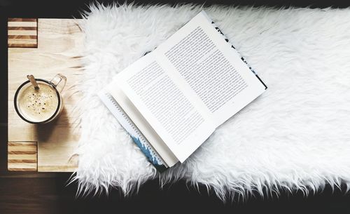 High angle view of book on table