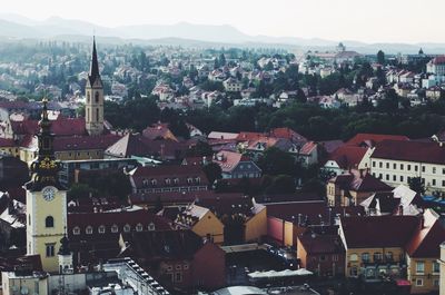 Aerial view of town against sky