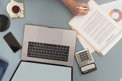 High angle view of mobile phone on table