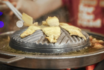 Close-up of meat in container