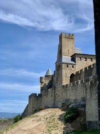 Low angle view of historic building against sky