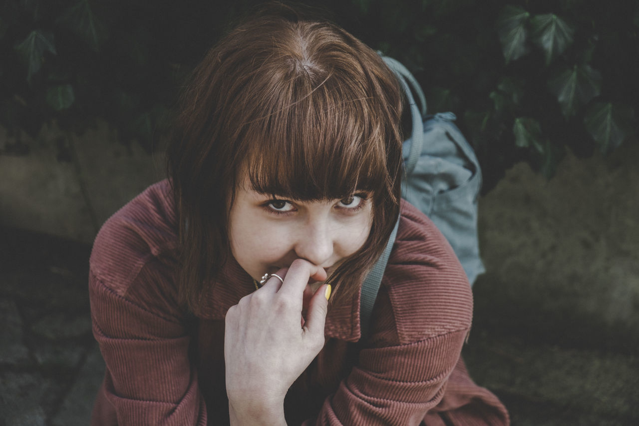 one person, portrait, real people, lifestyles, looking at camera, front view, leisure activity, young adult, headshot, focus on foreground, casual clothing, hairstyle, young women, emotion, women, hair, child, childhood, bangs, contemplation, teenager