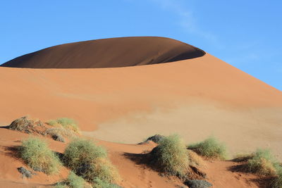 Scenic view of desert against sky